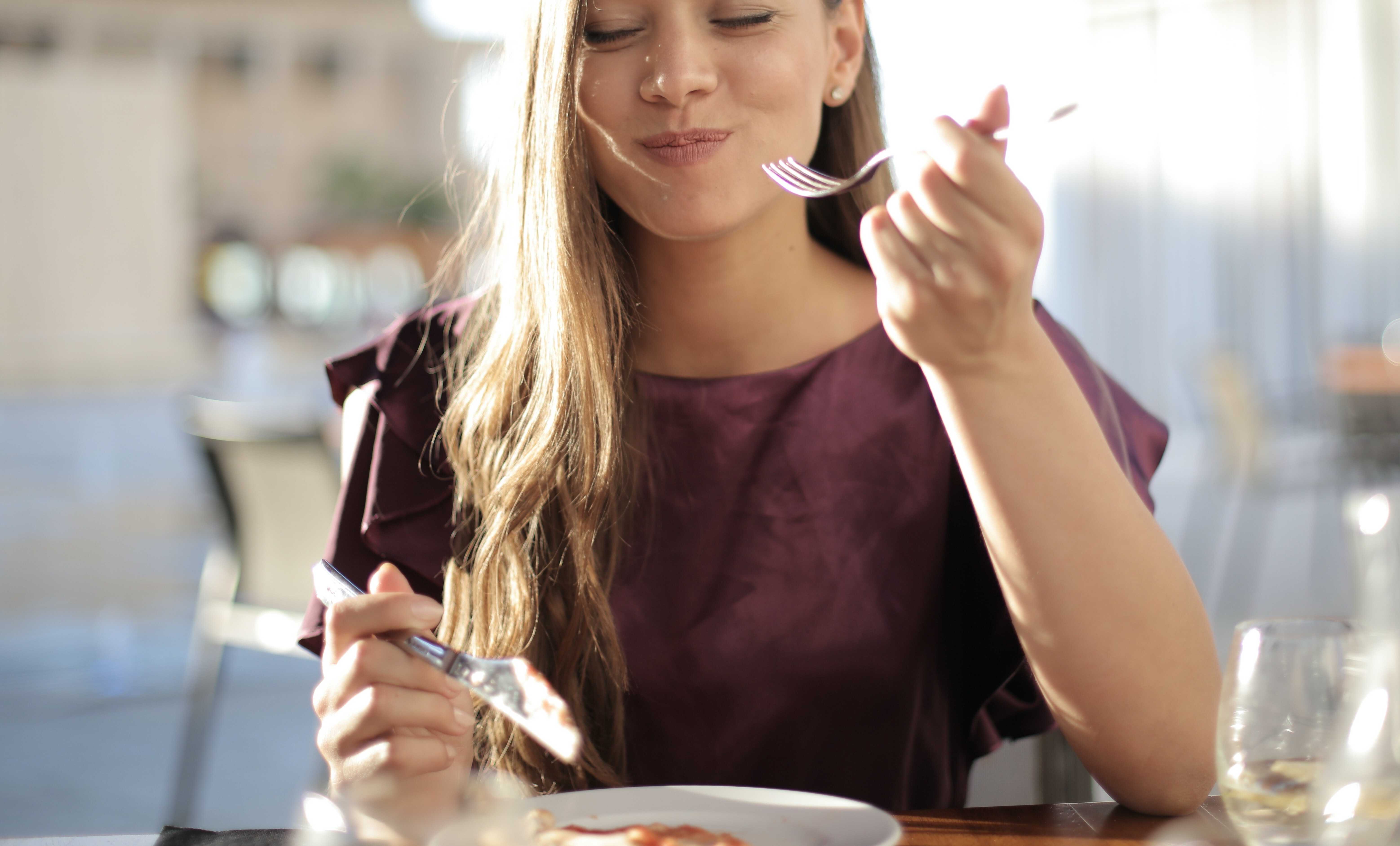 happy woman eating